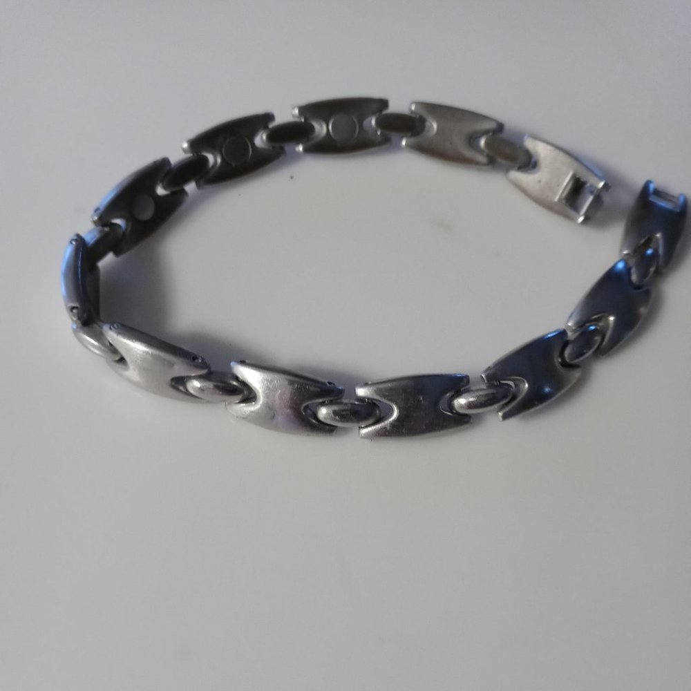 Non magnetic silver tone industrial looking bracelet